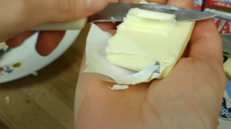 Масло, скриншот из YouTube
