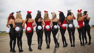 Hugh Hefner Arrives At Stansted Airport For Launch Of Playboy Club London