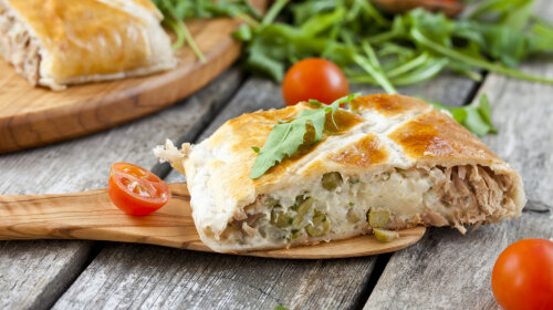 pie of puff pastry with tuna, rice and egg