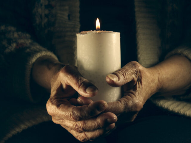 Candle in hand