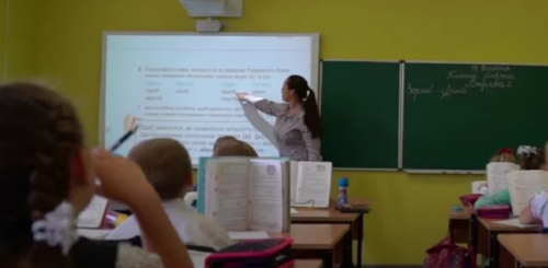 Школа, вчитель, урок, кадр з відео