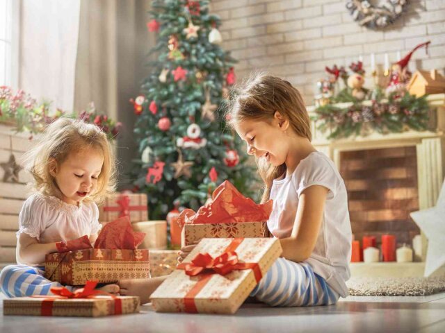 girls opening gifts