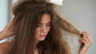 Woman With Holding Long Damaged Dry Hair. Hair Damage, Haircare.