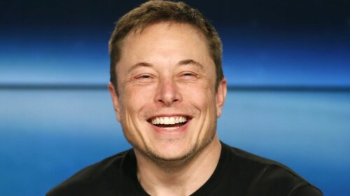 SpaceX founder Musk smiles at a press conference following the first launch of a SpaceX Falcon Heavy