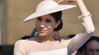 Meghan, Duchess of Sussex attends a garden party at Buckingham Palace, in London