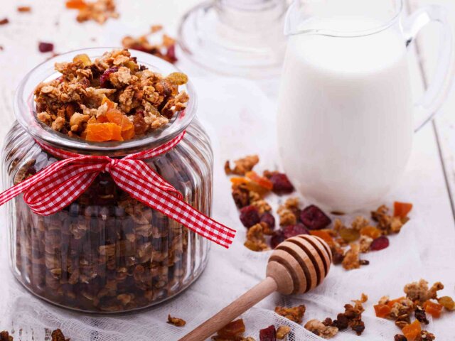 Granola from several types of cereals with nuts,honey,raisins