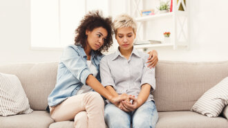 Two women talking about problems at home