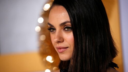 Cast member Kunis poses at the premiere for A Bad Moms Christmas» in Los Angeles