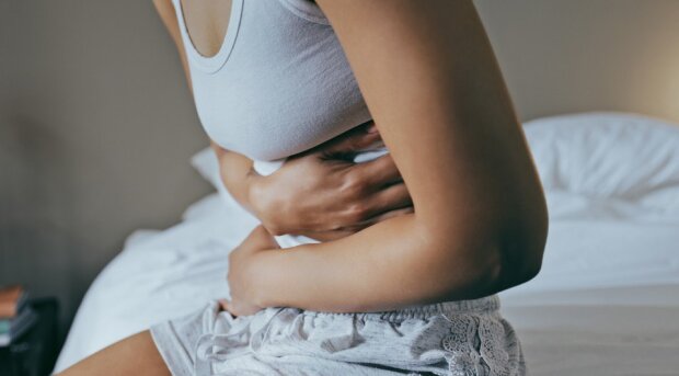 Боль в животе, месячные, изображение из свободных источников