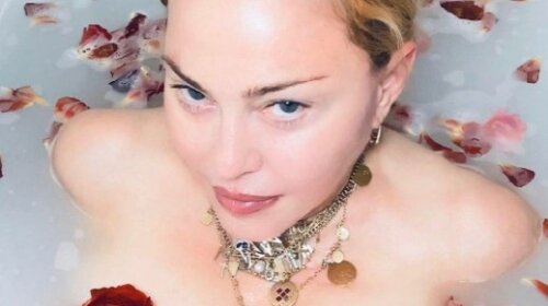 Обнаженная Мадонна в ванне назвала китайскую заразу "великим уравнителем"
