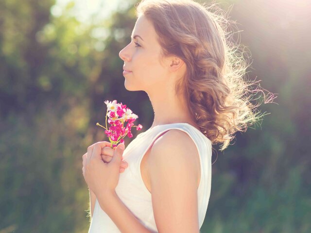 Beautiful woman with flowers.