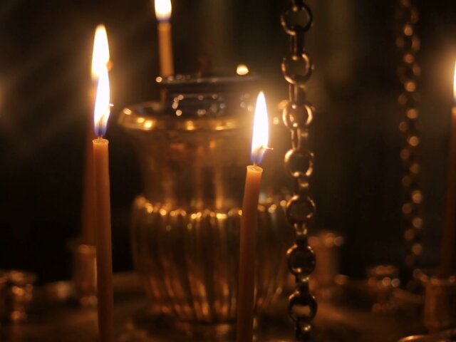 candles-in-the-church-standing-in-the-golden-round-candle-holder_bia-d1_ul_thumbnail-full01