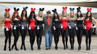 Hugh Hefner Arrives At Stansted Airport For Launch Of Playboy Club London