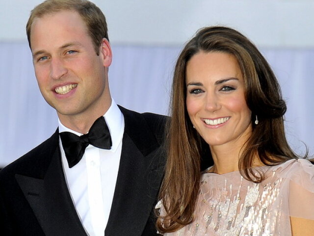 Britain’s Prince William and his wife Catherine, Duchess of Cambridge arrive for a charity din