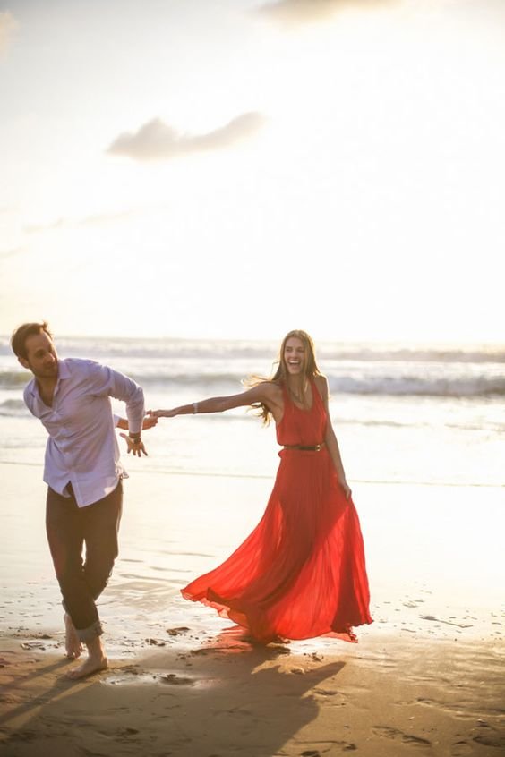 Dancing On The Shore In This Manhattan Beach Sunset Engagement Session | Photograph by T. C. Engle Photography