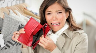 empty wallet — woman with no money shopping