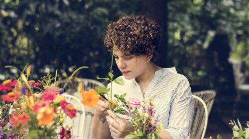 Woman arranging and flowers decorating