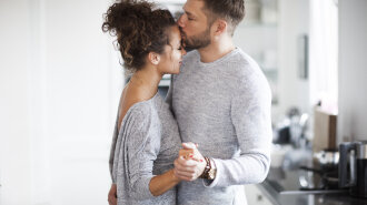 Two Lovers dancing in the kitchen.